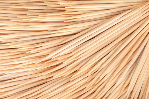 abstract background of wooden toothpicks close-up