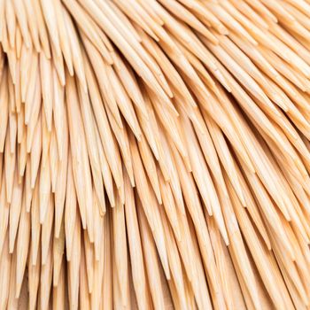 abstract background of wooden toothpicks close-up