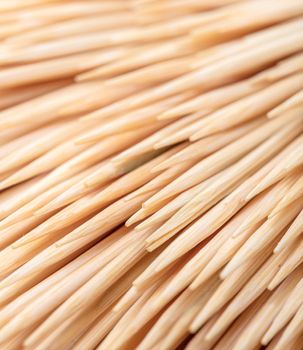 abstract background of wooden toothpicks close-up