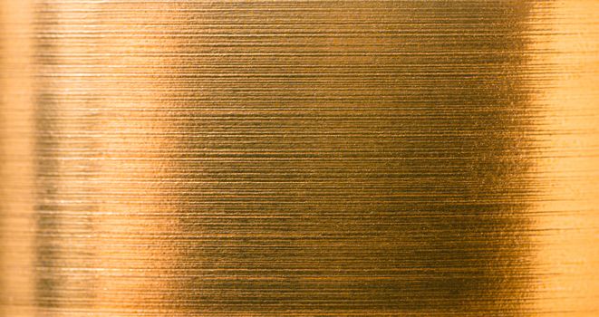 abstract background from a gold foil close-up texture