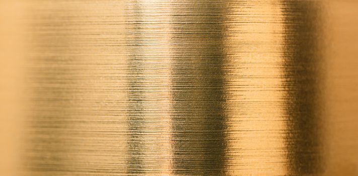 abstract background from a gold foil close-up texture