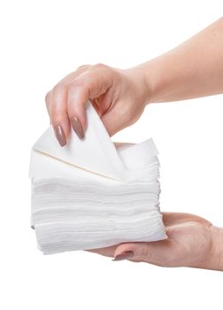 pack of napkins in hands on white background isolated