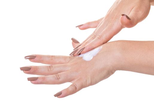 female hands in cosmetic cream on white isolated background