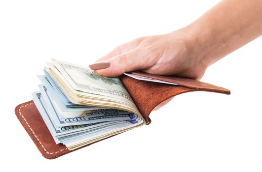 purse with money in hand on white isolated background