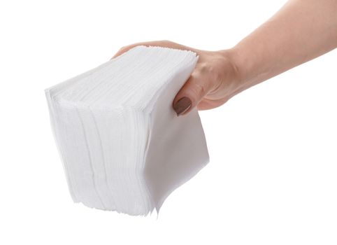 pack of napkins in hand on white background isolated