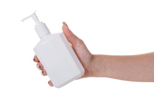bottle with liquid soap in hand on white isolated background