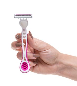 razor in a female hand on white isolated background