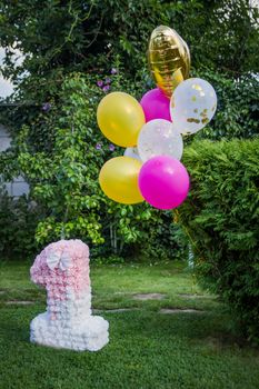 Decoration for one year birthday with balloons, anniversary outdoor