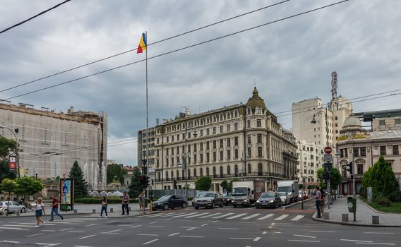 BUCHAREST, ROMANIA - 07.20.2018. Old Center of Bucharest, Romania in a cloudy summer morning. Sullen and unpleasant atmosphere, dirty streets and shabby buildings.