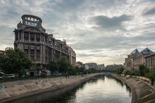 BUCHAREST, ROMANIA - 07.20.2018. Old Center of Bucharest, Romania in a cloudy summer morning. Sullen and unpleasant atmosphere, dirty streets and shabby buildings.