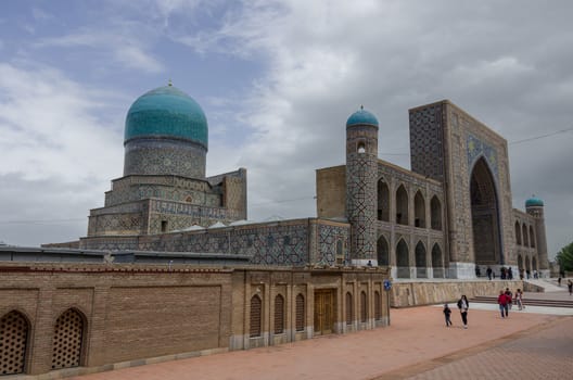 Samarkand, Uzbekistan - April 26, 2015: Madrasah Tilla-Kari on Registan square, Samarkand, Uzbekistan