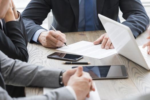 Business man sign contract on the desk at meeting