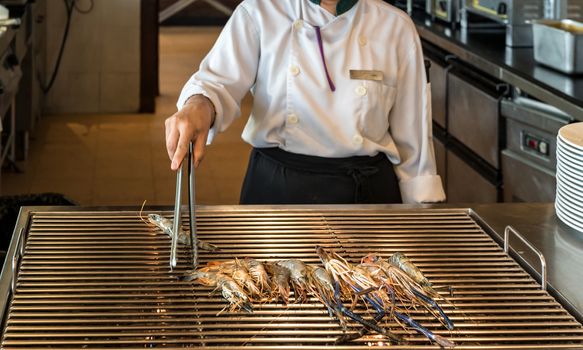 Chef cooking of Grilled Prawn
