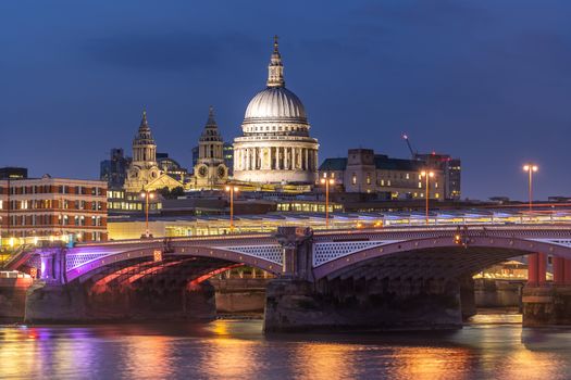 St paul cathedral with river thames sunset twilight in London UK. 