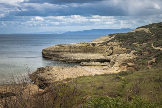 beautifull rocks at the coastline of sardinia island with blue sea mountains and great nature in wild landscape