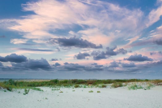 Empty sea coast beach with cloudy sunset or sunrise cloudy skyview