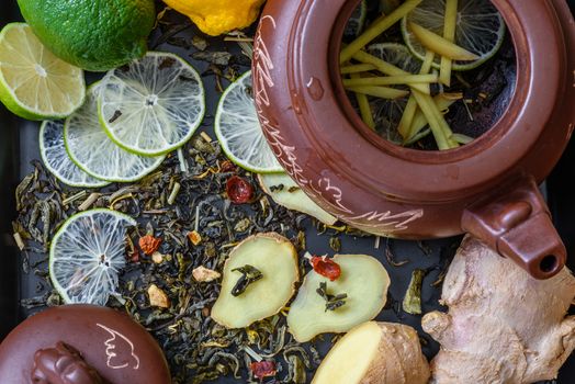 Ingredients for tea with lime and ginger. Beverage helpful for colds.