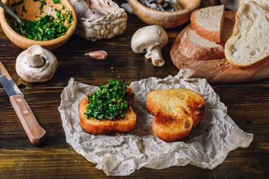 Bruschetta with Fresh Italian Herbs Mix and Baked Slice of Ciabatta