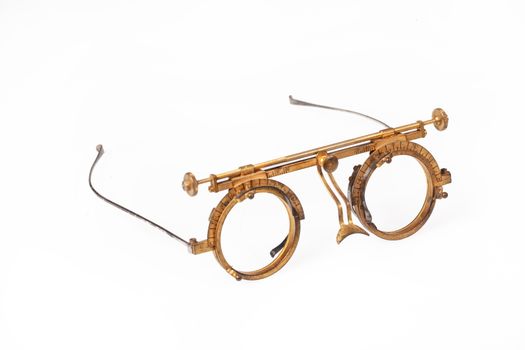 Old optometric device to choose the correct lense on isolated background