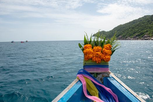 The flower at the head of the boat is sacred. Ancient beliefs