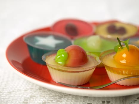 Colorful Coconut jelly Thai dessert with Look Choup , the dessert plated balls