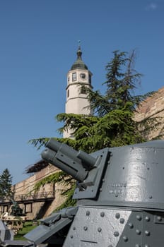 Sahat kula, the clock tower and gate of the Belgrade Kalemegdan fortress or Beogradska Tvrdjava, and a part of the outdoor exhibition of the Military Museum in Serbia