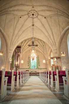Inside Church with Rows of Benches.