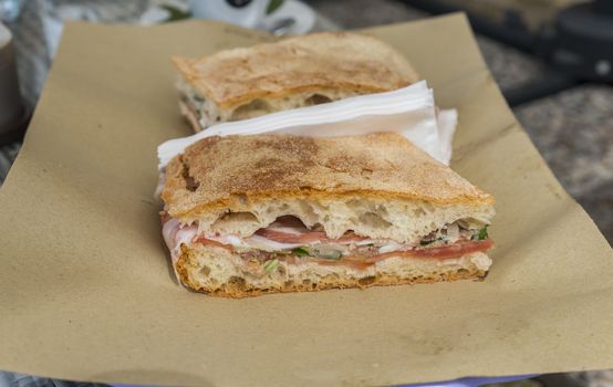 traditional Italian focaccia stuffing with cheese ham herbs and tomato