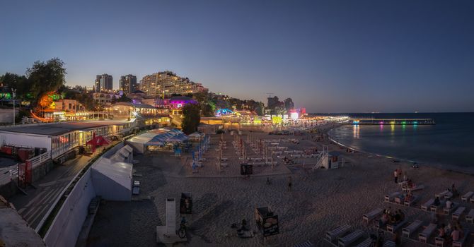 ODESSA, UKRAINE - 08.08.2018. Panoramic view of Arcadia city beach in a hot summer night. Famous touristic place in Ukraine