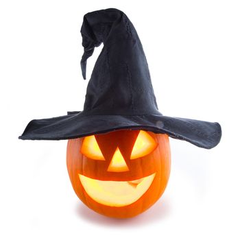 Jack O Lantern Halloween pumpkin with witches hat isolated on white background