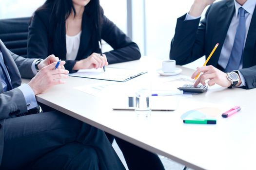 Business people working with documents and data statistics at office table