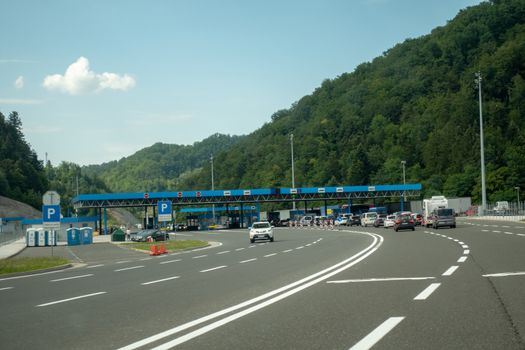 Macelj, Gruskovje - Border Slovenia and Croatia, July 9 2018: Cars, buses and trucks waiting to cross from Croatia to Slovenia in summer. Due Schengen regime controls on Slovene side are stricter.
