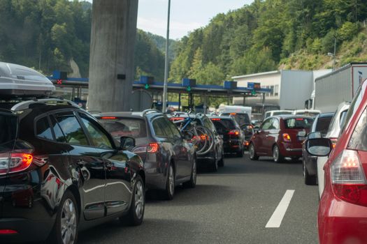 Macelj, Gruskovje - Border Slovenia and Croatia, July 9 2018: Cars, buses and trucks waiting to cross from Croatia to Slovenia in summer. Due Schengen regime controls on Slovene side are stricter.