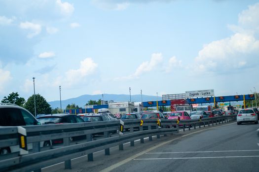 Zagreb, Croatia - July 9 2018: Heavy trafiic with congestions at Toll gate Lucko in Zagreb, Croatia during touristic season as tourist return from vacation