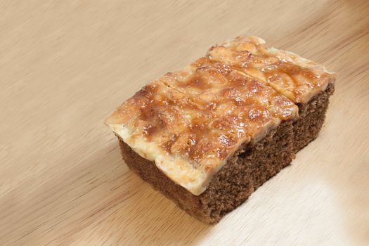 Toffee Cake Slice on wooden plate