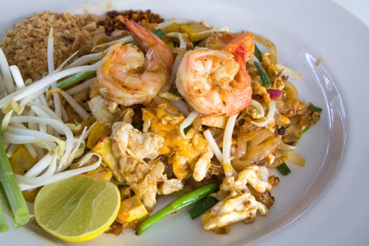 Pad Thai with Shrimps (Thai Traditional Food) on white plate