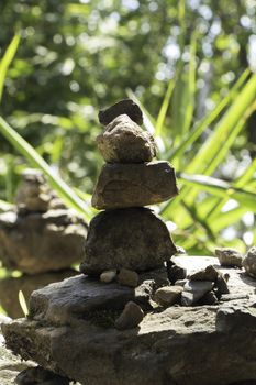 Stone Balancing in forest on daylight 