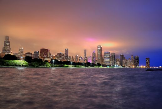 The Chicago skyline at night after a storm across Lake Michigan.