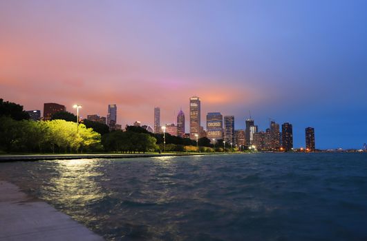 The Chicago skyline at night after a storm across Lake Michigan.