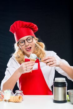 Portrait of an emotional chef who prepares cream ice cream