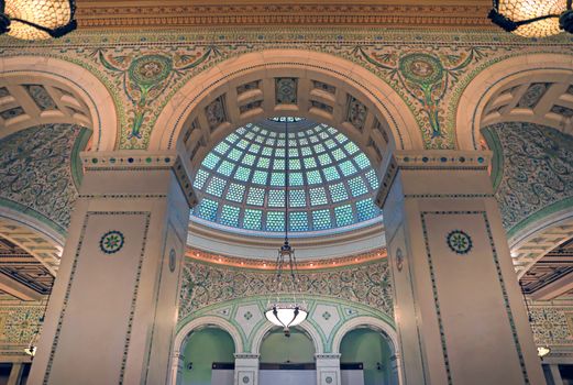 Chicago, Illinois, USA - June 22, 2018 - View of the interior and of the dome at the Chicago Cultural Center.