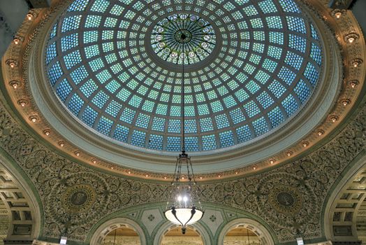 Chicago, Illinois, USA - June 22, 2018 - View of the interior and of the dome at the Chicago Cultural Center.