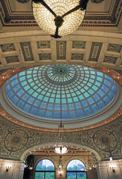 Chicago, Illinois, USA - June 22, 2018 - View of the interior and of the dome at the Chicago Cultural Center.