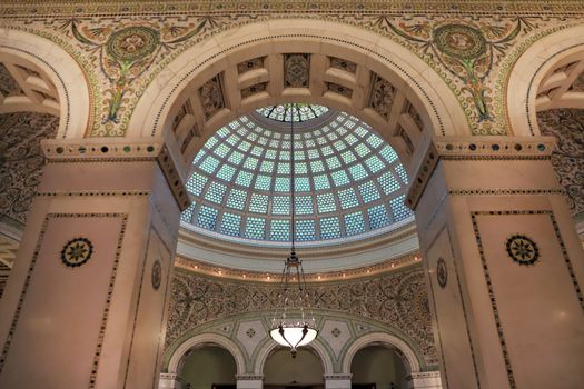 Chicago, Illinois, USA - June 22, 2018 - View of the interior and of the dome at the Chicago Cultural Center.