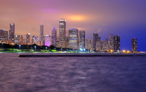 Chicago, Illinois, USA - June 22, 2018 - The Chicago skyline at night after a storm across Lake Michigan.