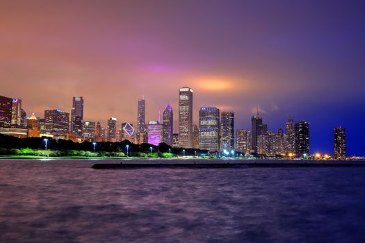 Chicago, Illinois, USA - June 22, 2018 - The Chicago skyline at night after a storm across Lake Michigan.