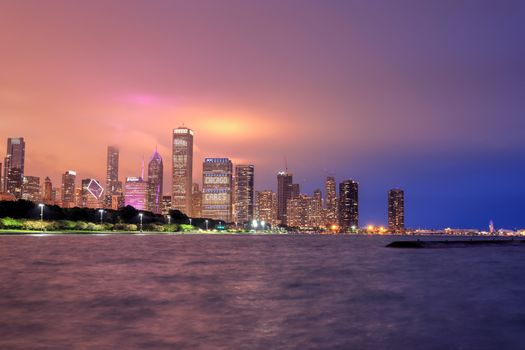 Chicago, Illinois, USA - June 22, 2018 - The Chicago skyline at night after a storm across Lake Michigan.