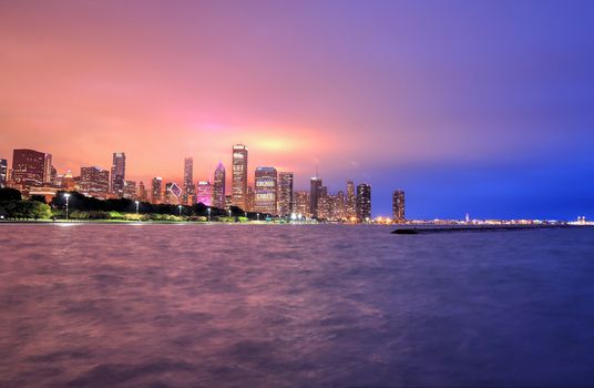 Chicago, Illinois, USA - June 22, 2018 - The Chicago skyline at night after a storm across Lake Michigan.