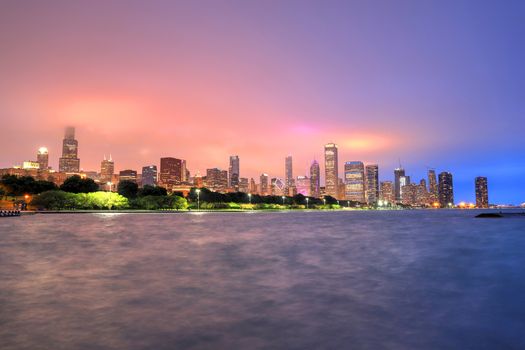 Chicago, Illinois, USA - June 22, 2018 - The Chicago skyline at night after a storm across Lake Michigan.