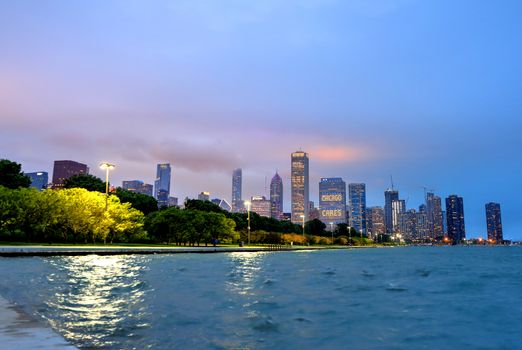 Chicago, Illinois, USA - June 22, 2018 - The Chicago skyline at night after a storm across Lake Michigan.